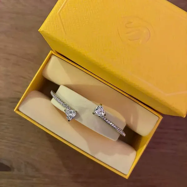 Vòng Đeo Tay Nữ Swarovski Mesmera Bangle Heart White Rhodium Plated Bracelet 5535354 Màu Bạc Size S