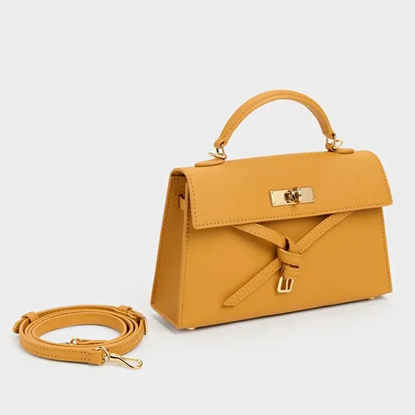 Túi Xách Tay Nữ Charles & Keith CNK Tricha Knotted Belt Top Handle Bag CK2-50701691 Saffron Yellow Màu Vàng