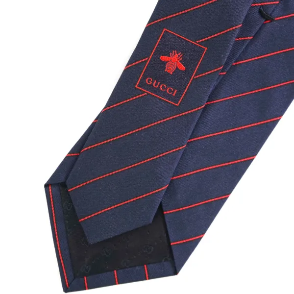 Cà Vạt Nam Gucci Navy & Red GG Logo Stripe Slim Tie 547302 4E002 4074 Màu Xanh Navy