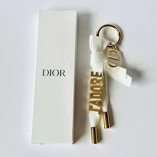 Móc Khóa Dior J’Adore Key Ring Gold Ribbon Keychain Màu Vàng/Trắng