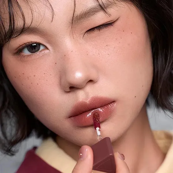 Son Tint Bóng 3CE Gummy Oil Tint 05 Mocha Syrup Màu Nâu Sữa 4g