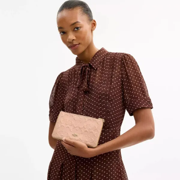 Túi Cầm Tay Nữ Coach Ashton Wristlet In Signature Leather CEN12 Màu Hồng Nhạt