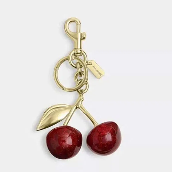 Móc Khóa Charm Coach Cherry Bag 77840 Brass/ Red Apple Màu Vàng Đỏ