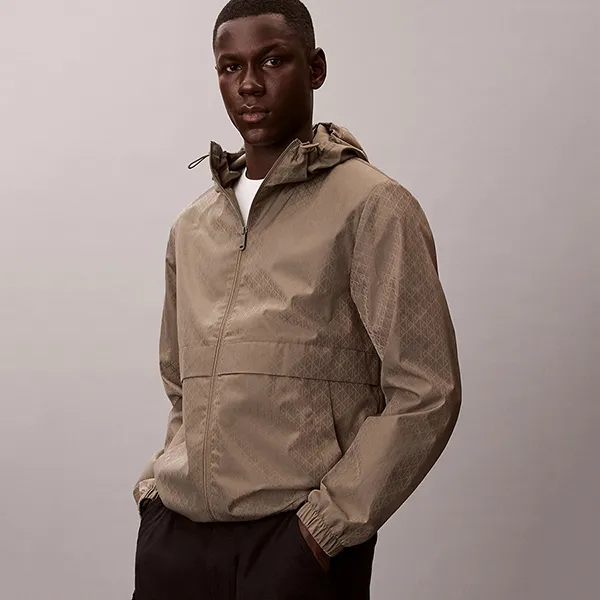 Áo Khoác Gió Nam Calvin Klein CK LS Aop Nylon Flange Windbreake RF522 - 030 Màu Nâu Size XS