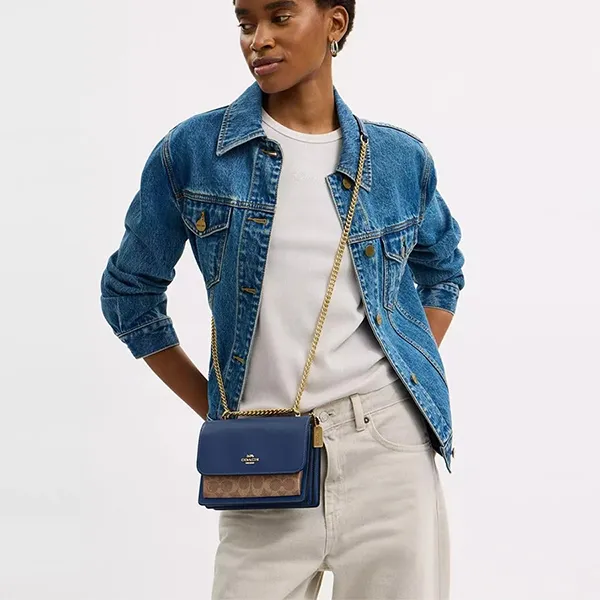 Túi Đeo Chéo Nữ Coach Mini Klare Crossbody Bag In Signature Canvas Deep Blue Tan CBR07 Màu Xanh Nâu