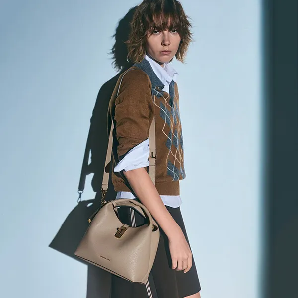Túi Xách Tay Nữ Charles & Keith CNK Chance Turn-Lock Bucket Bag CK2-10701618 Taupe Màu Nâu Xám