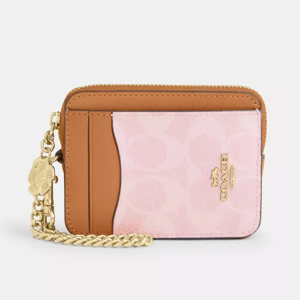 Ví Nữ Coach Zip Card Case In Signature Canvas With Charm CEC50 Màu Hồng Nâu