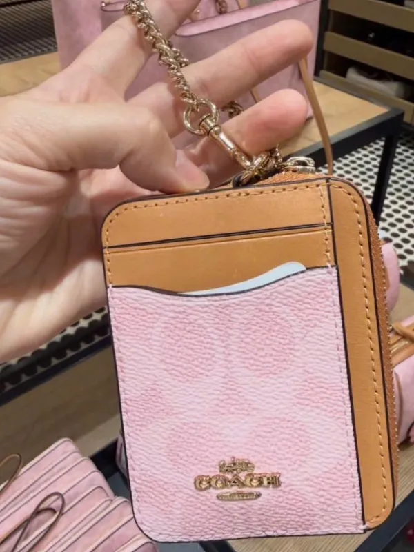 Ví Nữ Coach Zip Card Case In Signature Canvas With Charm CEC50 Màu Hồng Nâu