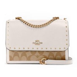 Túi Đeo Chéo Coach Klare Crossbody In Signature Canvas With Rivets Màu Trắng