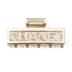 Kẹp Tóc Chanel Crystal Logo Hair Claw Màu Vàng Gold