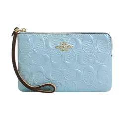 Ví Nữ Coach Corner Zip Wristlet In Signature Leather With Charm CEX36 Màu Xanh Nhạt