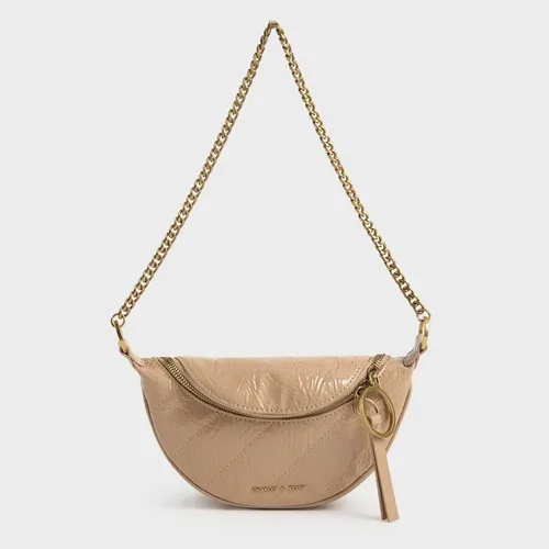 Túi Đeo Vai Nữ Charles & Keith CNK Wrinkled Patent Ring Zip Tassel Crossbody Bag 80150844 Màu Be