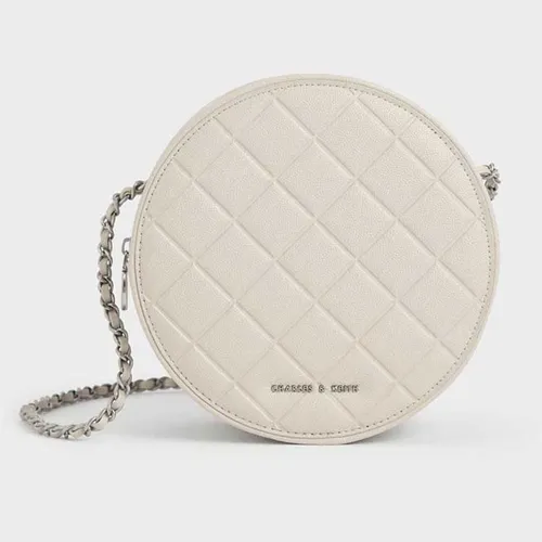 Túi Đeo Chéo Nữ Charles & Keith CNK Quilted Circle Bag Cream CK2-80680915