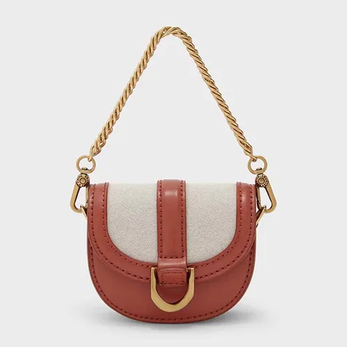 Túi Xách Nữ Charles & Keith CNK Micro Gabine Two-Tone Saddle Bag​ Brick 80781630 Màu Cam Gạch