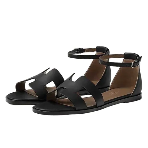 Dép Sandal Nữ Hermès Santorini Màu Đen Nâu Size 37.5