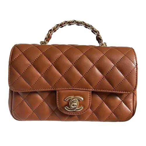 CHANEL Brown Suede Distressed Old M Boy  portluxe