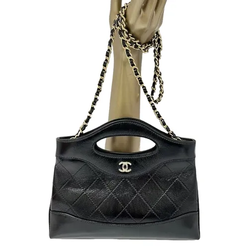 Túi Đeo Chéo Nữ Chanel 24C 31 Mini Nano Bag Màu Đen