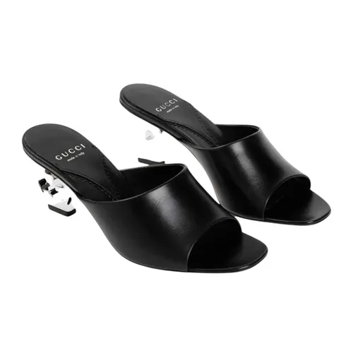 Dép Cao Gót Nữ Gucci Bella Black Leather Sandals Silver-tone Interlocking 772569 C9D00 1000 Màu Đen Size 36.5