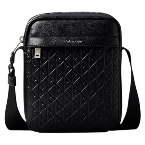 Túi Đeo Chéo Nam Calvin Klein CK Embossed Allover Monogram Reporter Bag 4D3204G - 001 Màu Đen