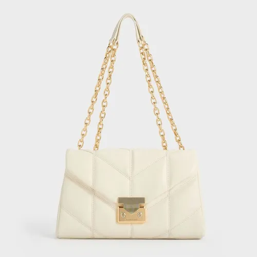 Túi Đeo Vai Nữ Charles & Keith CNK Eudora Chevron Trapeze Bag - Cream CK2-20782014_CREAM Màu Trắng Kem