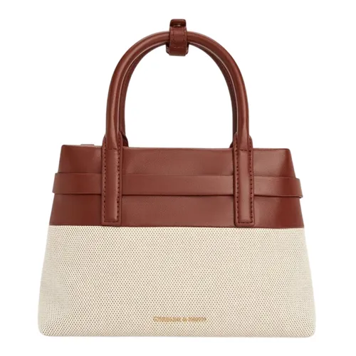 Túi Xách Tay Nữ Charles & Keith CNK Mini Behn Canvas Belted Trapezoid Handbag Brick CK2-30782821 Màu Be Nâu