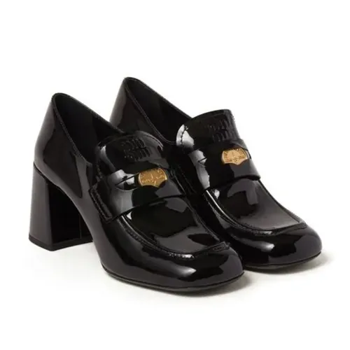 Giày Lười Nữ Miu Miu Leather Penny Loafers Màu Đen