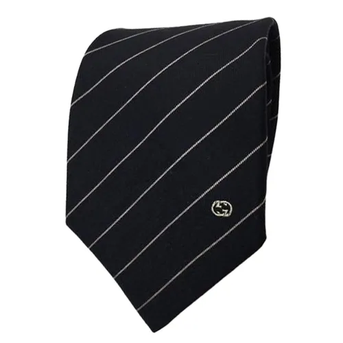 Cà Vạt Nam Gucci Tie Sire Gold Tone Interlocking G Pattern Striped Black Narrow Tie 547302 4E002 1079 Màu Đen