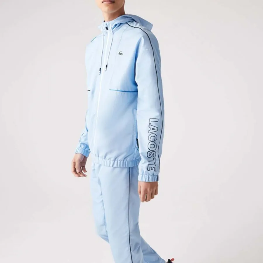 Bộ Quần Áo Gió Lacoste WH0879 CJX Overview Ibiza Màu Xanh Blue